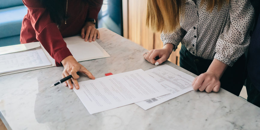 Real Estate: Young couple at a house showing