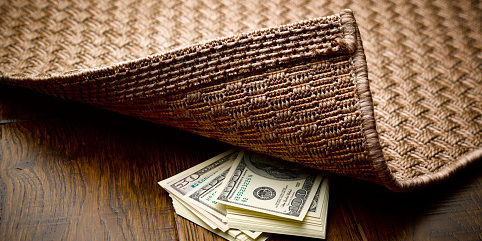 Money hidden under rug