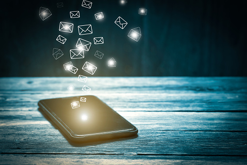 Email marketing and many envelopes in smartphone screen