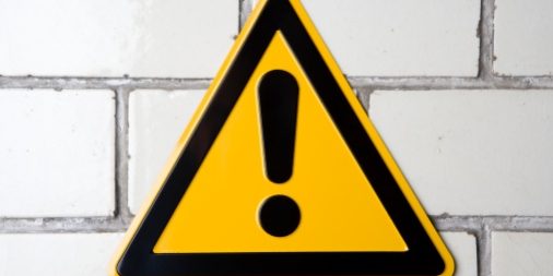 ?Hazard? warning sign