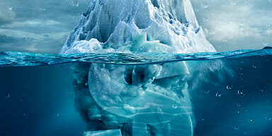 Dollar sign under floating glacier
