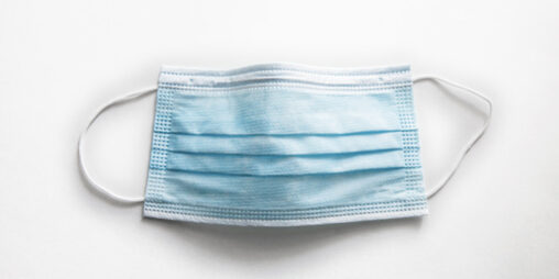 Surgical mask on white background