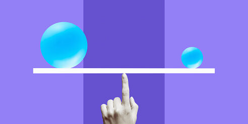 Balanced on a black and white finger